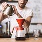 close up photo barista standing counter preparing pour coffee cafe_optimized_4000 1