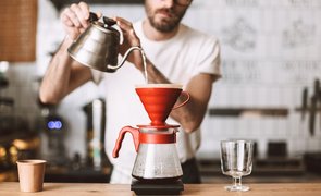 close up photo barista standing counter preparing pour coffee cafe_optimized_4000 1